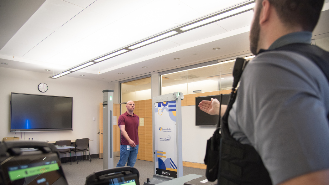 Members of LHSC's Security team providing a demonstration of the weapons detection system