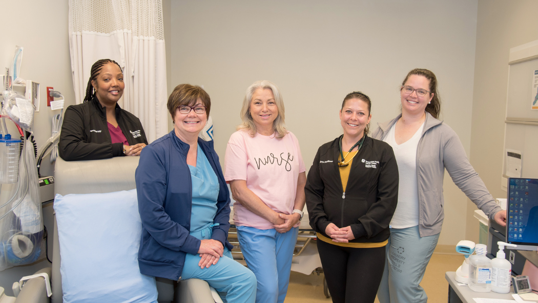 Photo from left to right: Halona Scott, RN, Colleen Parfrey-Roefs, RN, Cyndi Hoath, RN, Deanne Mulcahy, Nurse Practitioner, and Kim Shantz, Nurse Practitioner ready to support patients in the Systemic Therapy and Assessment Clinic in the Verspeeten Family Cancer Centre.