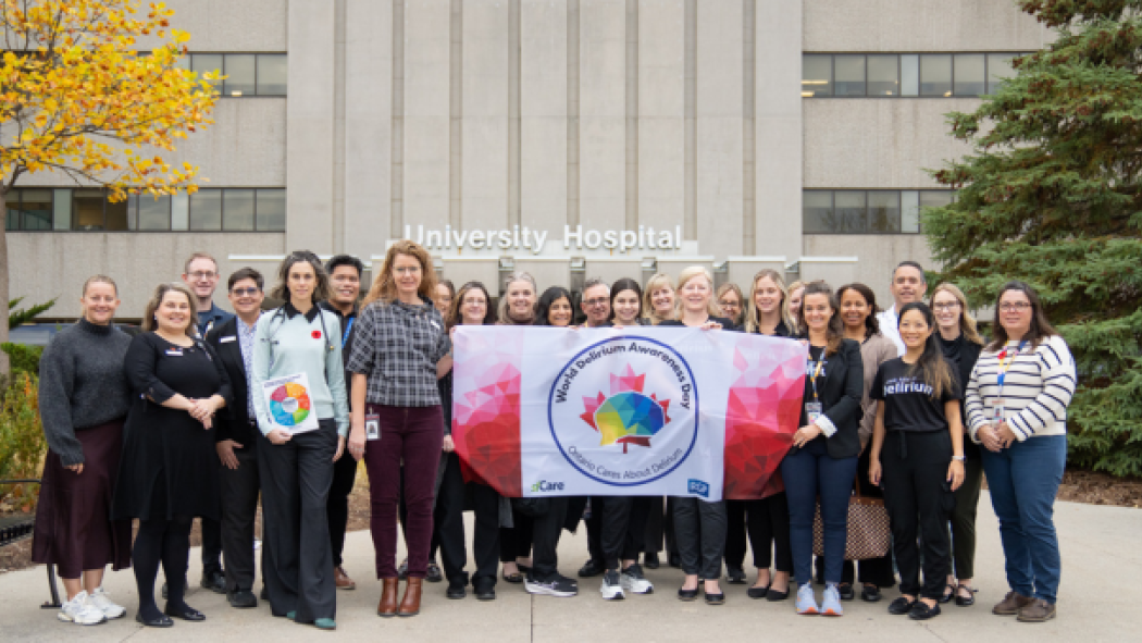 A group of staff are pictured with the Ontario delirium flag