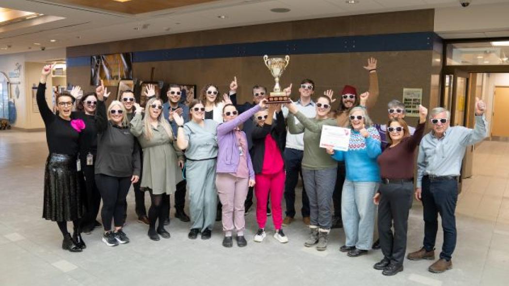 Image caption: Celebrating LHSC’s first-place award in the 2025 Canadian Blood Services Hospital Challenge while holding the CBS Hospital Challenge trophy. Back row (left to right): Elaine Gutierrez, Oliver Welner, Rani Odesh, Chloe Hill, David Musyj Alex Tyml, Serge Parent, Gwendolyn St John, Glen Dietz. Front row (left to right): Tania Testa, Cathy Zantingh, Vanessa Switzer, Melissa Kaups, Shawna Lee Howell, Heather Trotter, Danielle Walker, Kim Muszka, Marisa Gatfield 