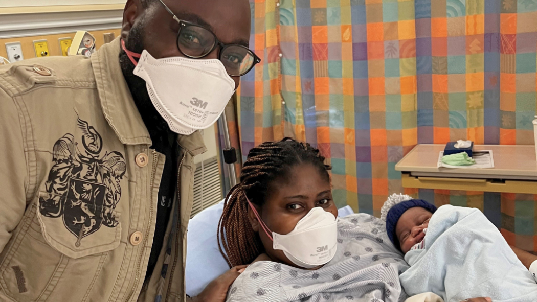 Parents with their newborn baby in the hospital