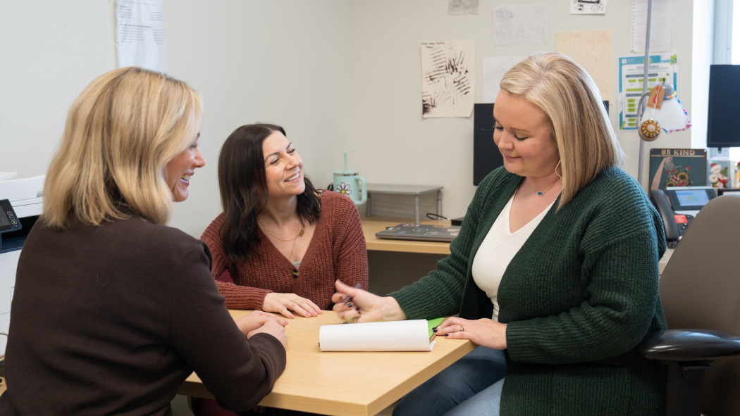 From left, Danielle Rai, Clinical Manager, Adult Inpatient Mental Health, meeting with Rechelle Jesso and Catherine Bowser, Transitional Case Management Outreach staff. 